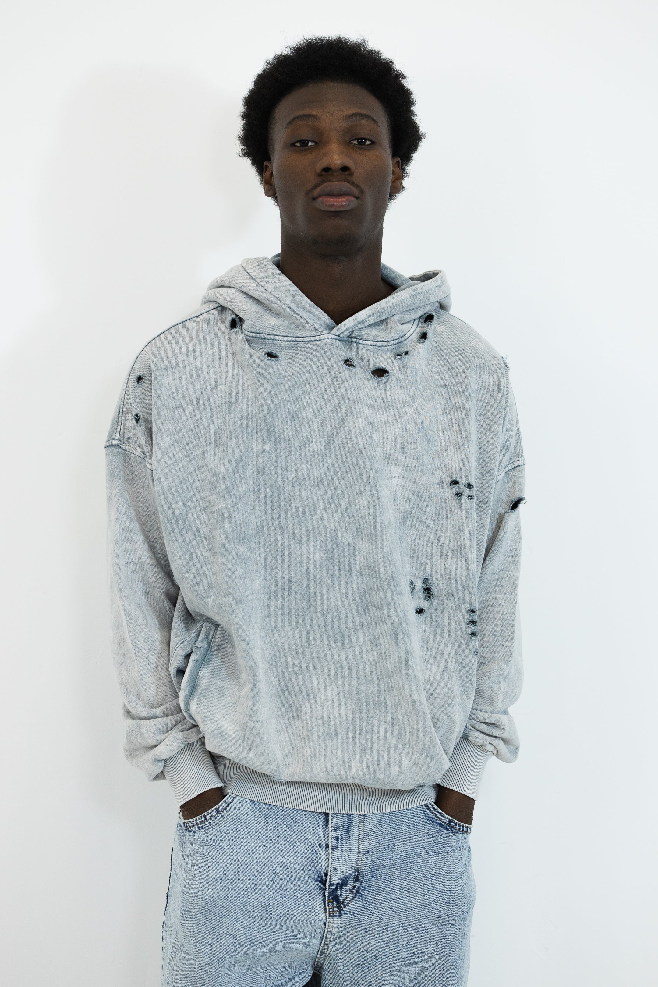 HOODIE TROUÉ BOXY FIT