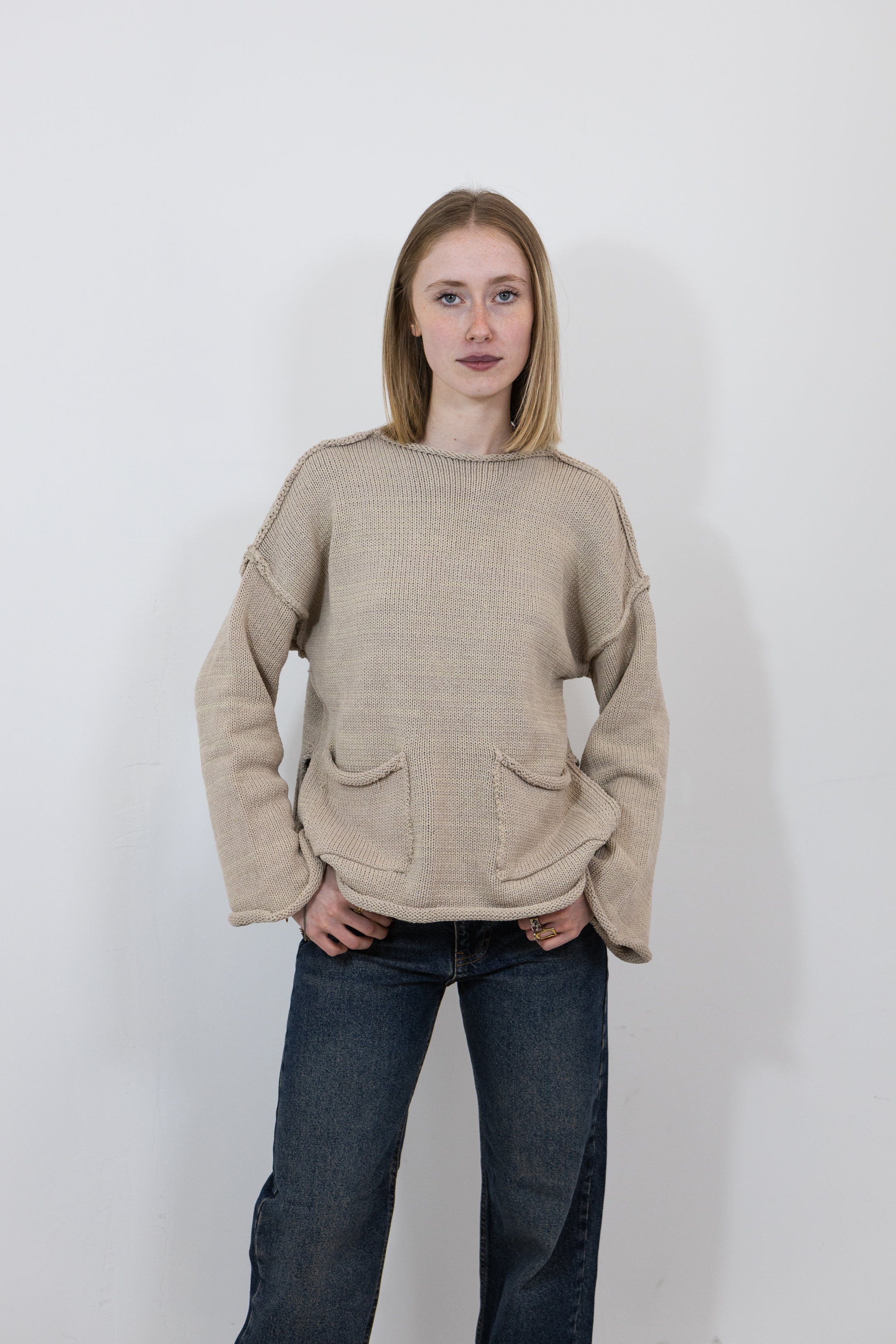 PULL EN MAILLE À POCHES