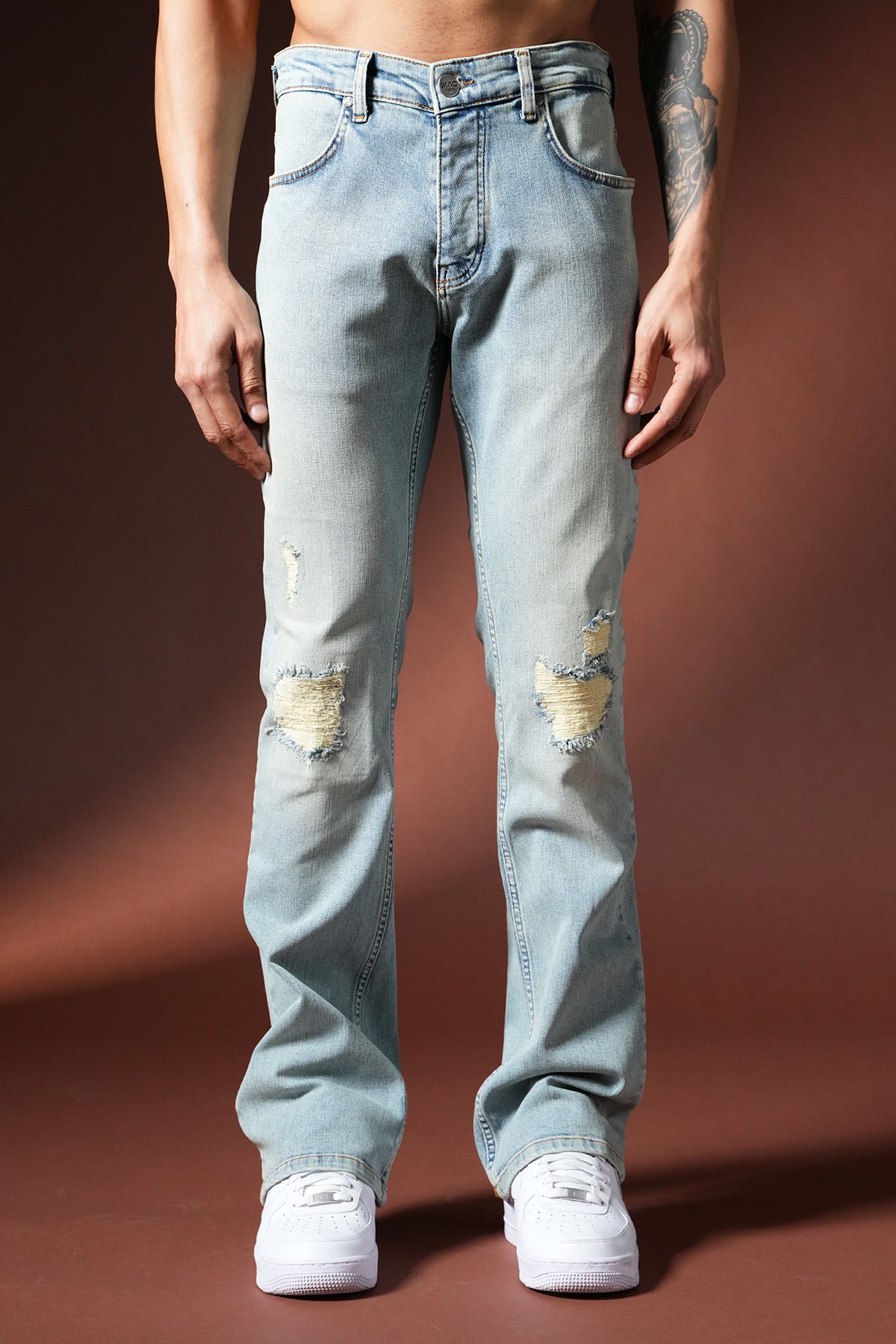 Jean flare scratched